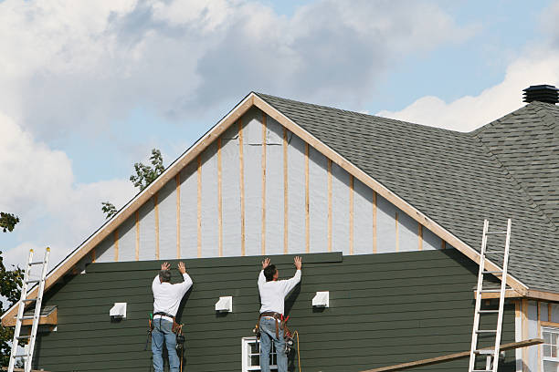 Professional Siding technician working in Hastings, FL